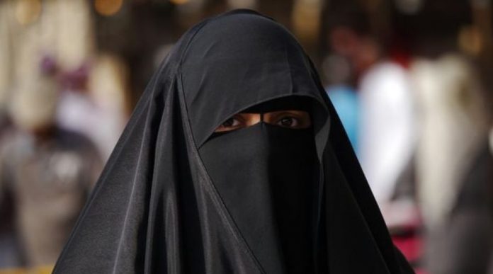 Naked Man, Wearing Burqa Trashed for Harassing Women in Karachi